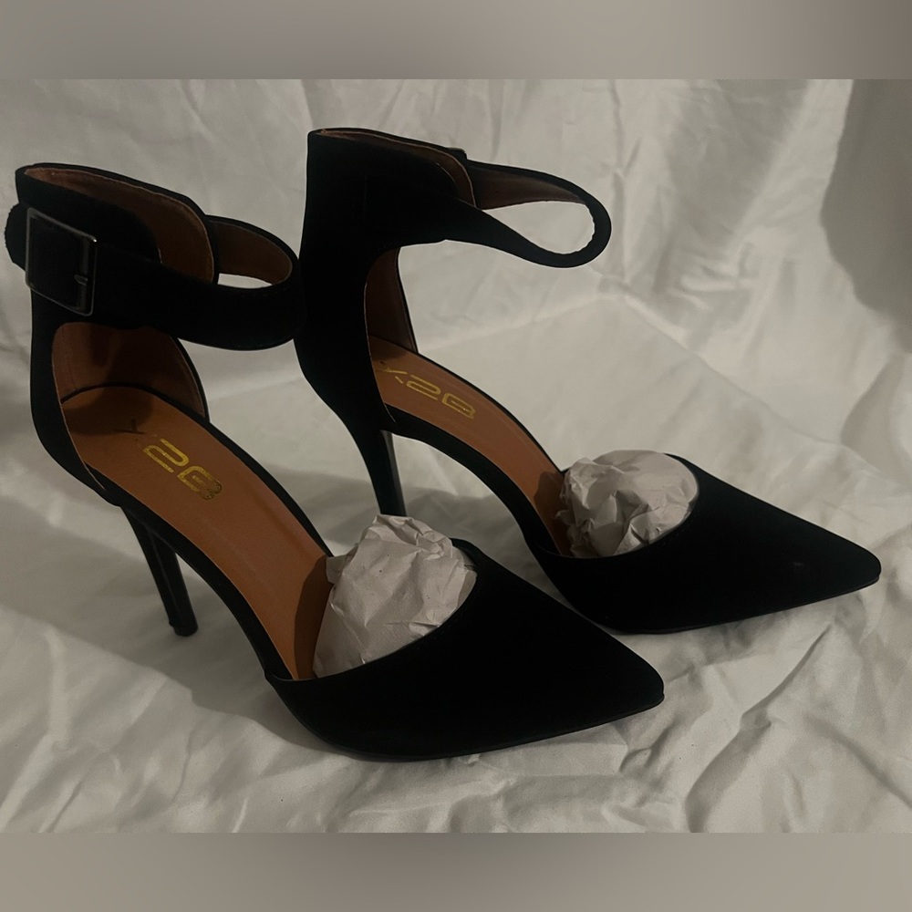 X2B brand new heels. Black Size 7.5 with box